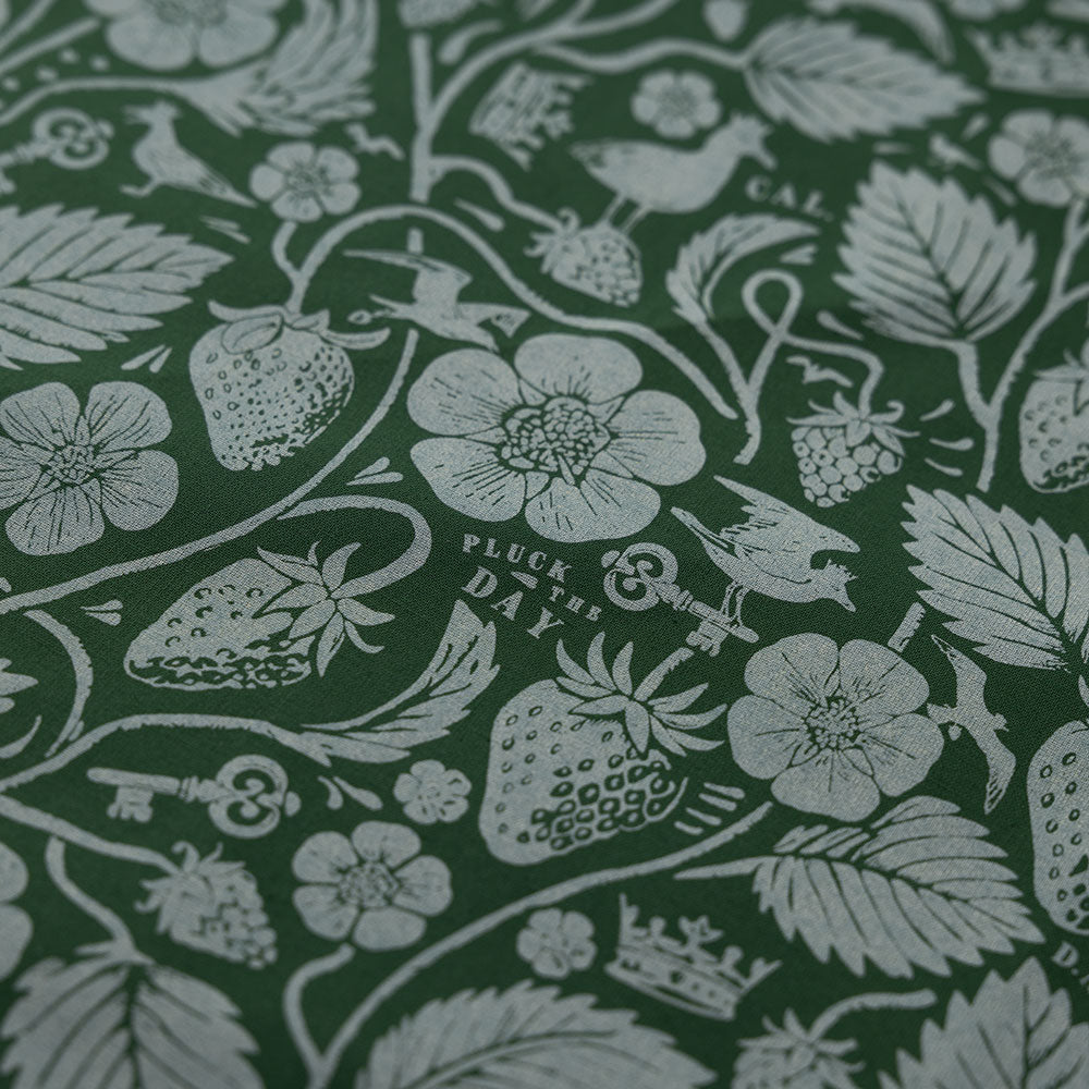 Close-up of the green Strawberry Thief bandana's berry and bird print